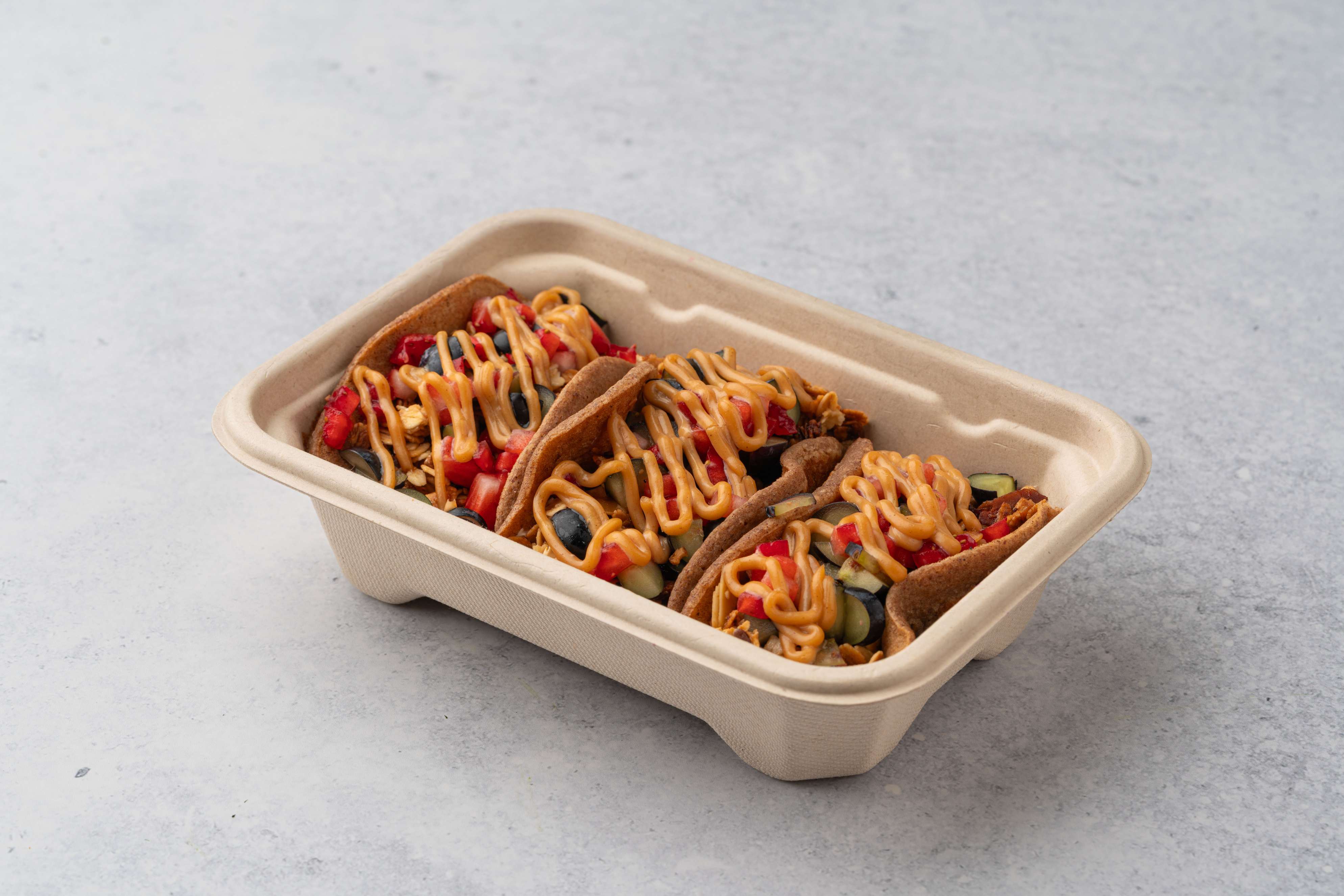 Healthy Banana Pancake Tacos With Toppings Greek Yogurt Fresh Berries Peanut Butter And Granola